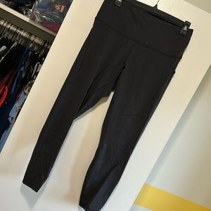 Lululemon legging with side pocket and drawstring top. Size 8.